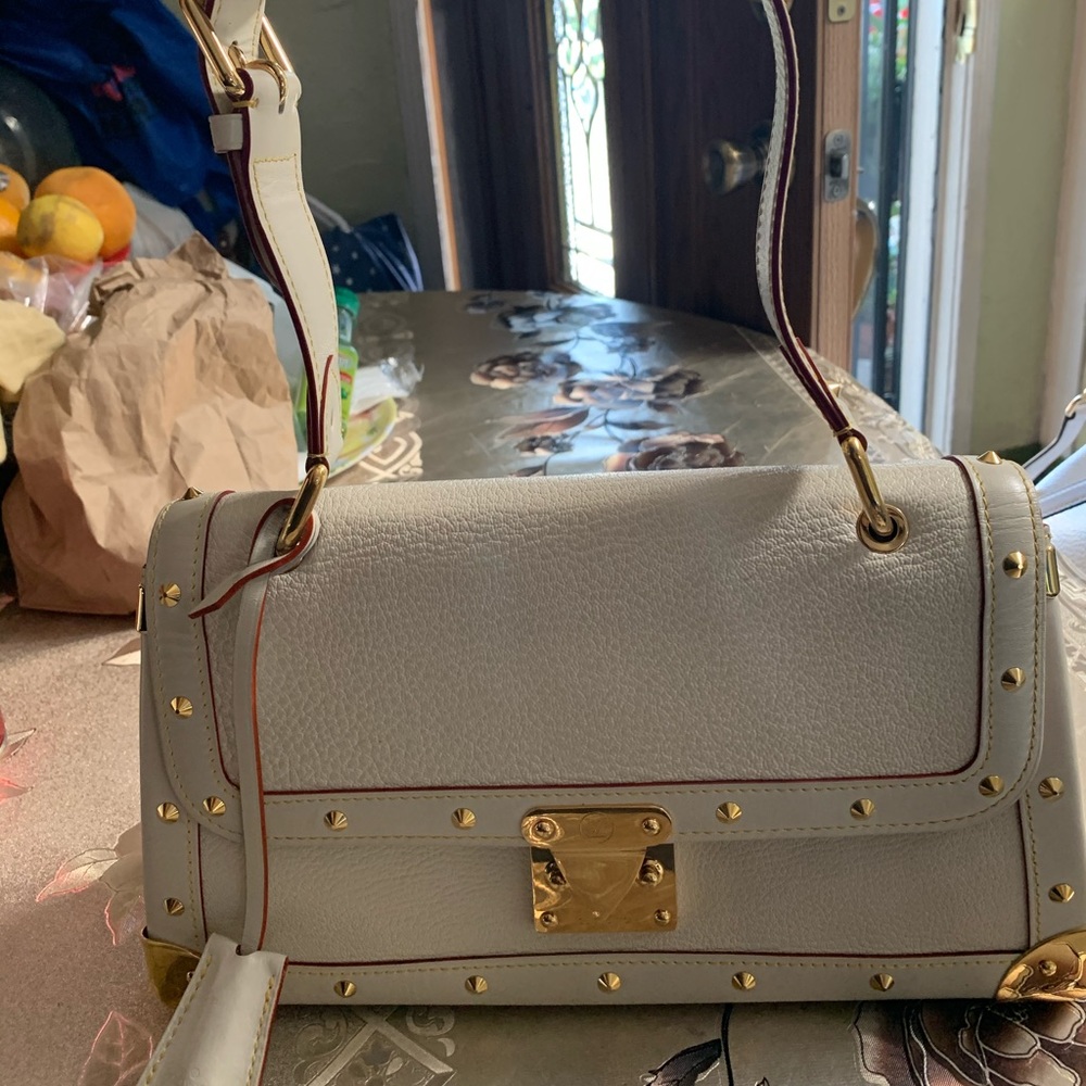 LV Le Talentueux purse